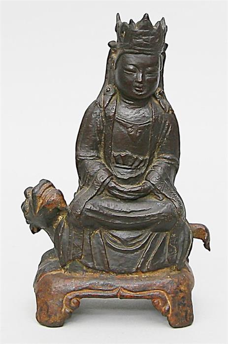 Guanyin, auf Qilin sitzend.
